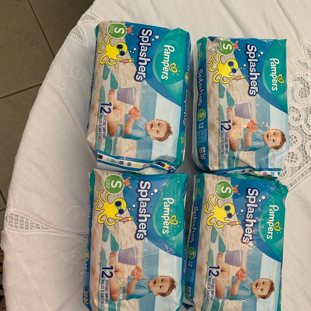 NWOT 4 packs of Pamper Splashers Small